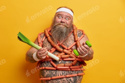 Preview: Funny Fatso Guy Poses With Sport Equipment And Green Leek, Wrapped By Sausages, Tries To Eat