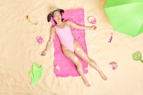 Preview: Top View Of Relaxed Asian Woman Rests At Beach Applies Sunscreen Cream Sleeps At Beach Dressed In