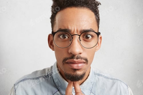Preview: Close Up Portrait Of Handsome Fashionable Young Mixed Race Male With Oval Face, Dark Eyes, Mustache