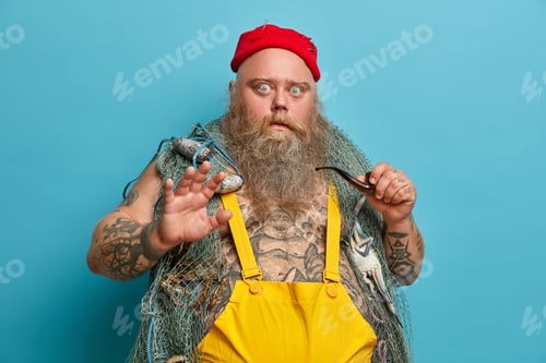 Preview: Shocked Scared Sailor Or Fisherman Keeps Palm In Rejection Gesture, Afraids Of Something Terrible