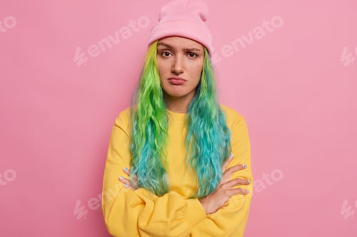 Preview: Upset Offended Woman Keeps Arms Folded Feels Unhappy Listens Bad News Dissatisfied While Talking