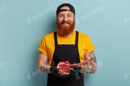 Preview: Positive Foxy Butcher Works In Processing Plant, Holds Raw Meat On Bone, Wears Yellow T Shirt