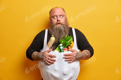 Preview: Obese Greedy Man Stocks Foodstuff, Eats Too Much, Suffers From Overweight And Gluttony, Keeps Hands