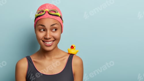 Preview: Close Up Shot Of Smiling Charming Good Looking Swimmer Feels Relaxed And Delighted After Swimming