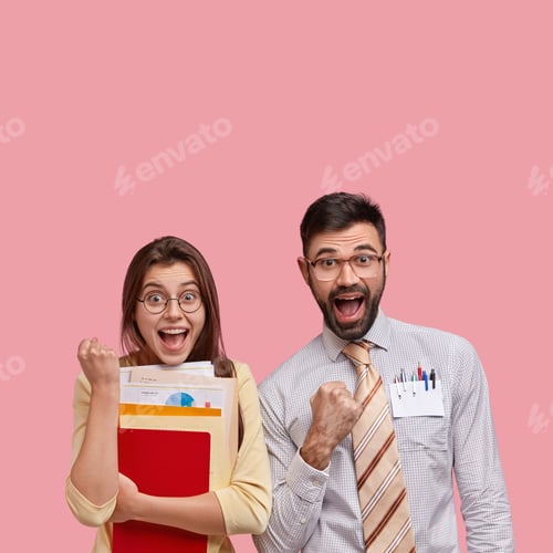 Preview: Image Of Joyful European Partners Clench Fists, Celebrate Something With Triumph, Achieve Success