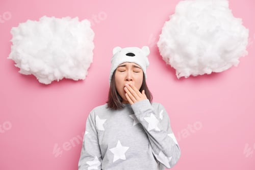 Preview: Sleepy Teenage Asian Girl Covers Mouth Yawns Wants To Sleep Has Problem Of Insomnia Dressed In