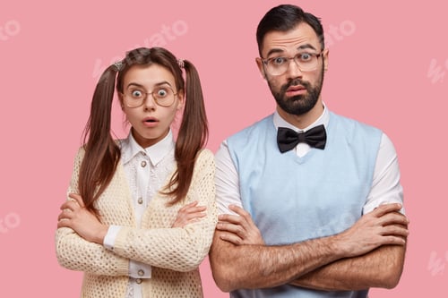 Preview: Photo Of Stupefied College Students Nerds Keep Arms Folded, Stare At Camera With Bugged Eyes