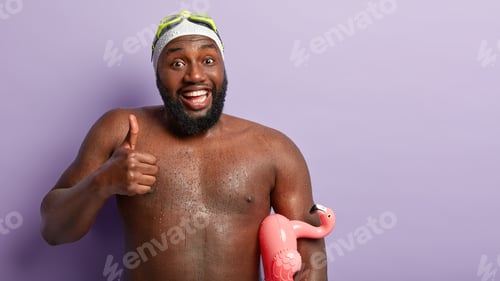Preview: Athlete Swimmer With Dark Skin, Has Wet Body After Swimming, Keeps Thumb Up, Says Weather Is