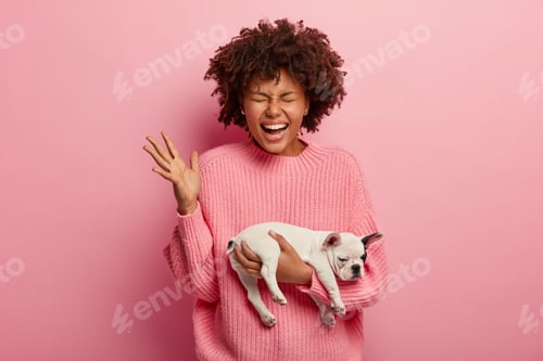 Preview: Emotions, People And Animals Concept. Energetic Happy Woman Has Overjoyed Facial Expression, Closes