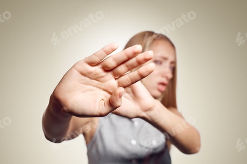 Preview: Irritated Woman Showing Her Hand Against Please Stop. Negative Emotion Facial Expression Feelings