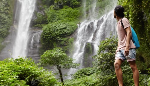 Preview: Full-Length Portrait Of Young Hiker Or Adventurer In Denim Shorts And Snapback Enjoying Nature