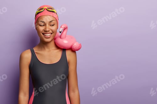 Preview: Vacation, Beach, Summer Concept. Smiling Dark Skinned Female Prepares For Pool Party, Wears Black