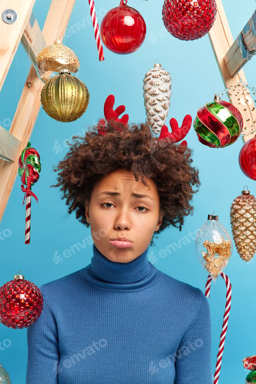 Preview: Upset Discontent Curly Haired Woman Wears Casual Poloneck Expresses Negative Emotions Feels Very