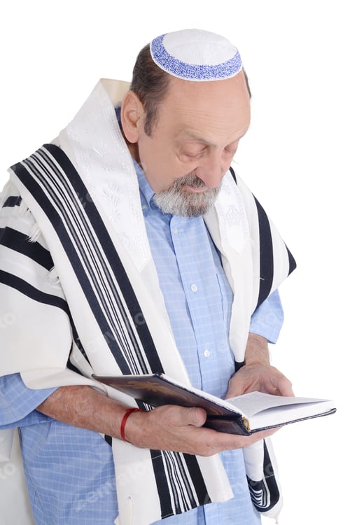 Preview: Eldery Jewish Man With Kippah And Wrapped In Talit Praying With Siddur. Religion Concept. Isolated