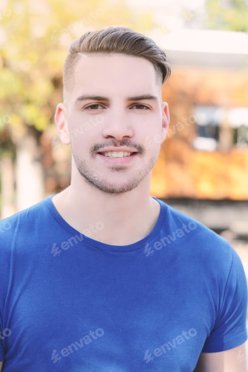 Preview: Portrait Of Young Latin Man. Urban Scene. Outdoors.
