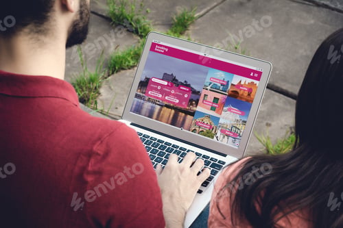 Preview: Close Up View Of Man With Laptop Booking A Hotel On Website. Travel Concept. All Screen Graphics
