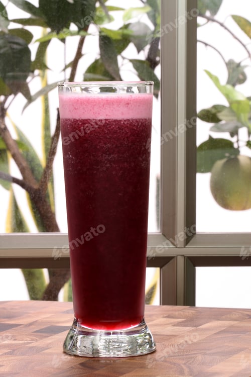 Preview: Glass Of Delicious Organic And Fresh Concord Grape Juice Full Of Antioxidants And Nutrients