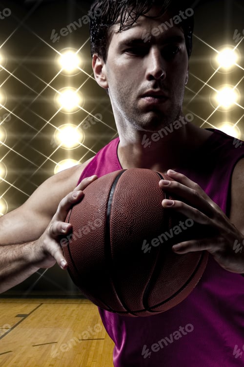 Preview: Basketball Player On A Pink Uniform, In Front Of Lights.