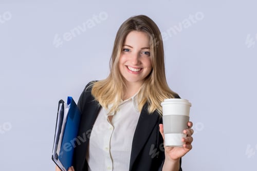 Preview: Portrait Of Young Business Woman With Folder On Studio.