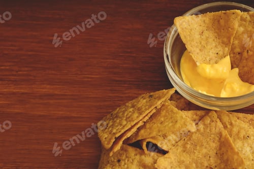 Preview: Top View Of Nachos With Cheese Dip. Unhealthy Food Concept