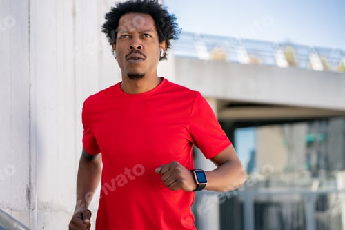 Preview: Athletic Man Running And Doing Exercise Outdoors.