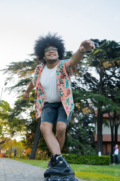 Preview: Afro Latin Man Rollerskating Outdoors.