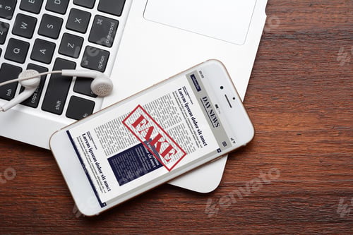 Preview: Close Up View Of Keyboard, Earphones And Digital Fake News On Smartphone. Propaganda And
