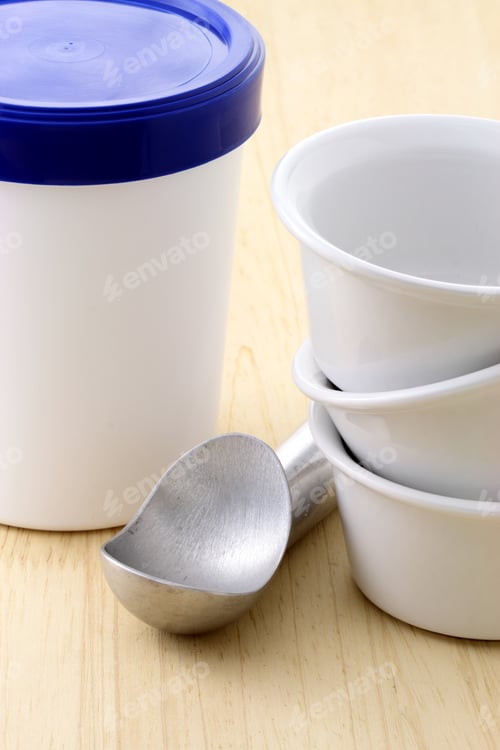 Preview: Packed Ice Cream And Scoop, Delicious Frozen Dessert Made From Dairy Products.