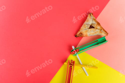 Preview: Top View Of Purim Background With Party Costume And Hamantaschen Cookies. Purim Celebration Concept