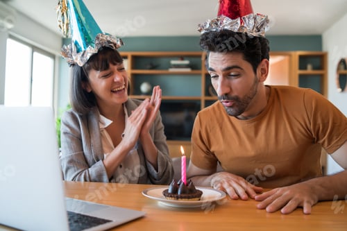 Preview: Couple Celebrating Birthday On A Video Call At Home.