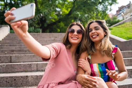 Preview: Two Friends Taking Selfie With Phone Outdoors.