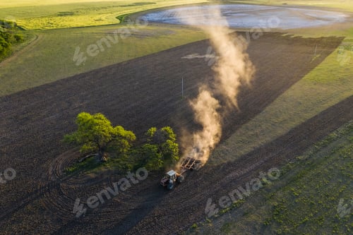 Preview: Tractor Plowing The Field, Pampas Countryside, La Pampa, Argentina.
