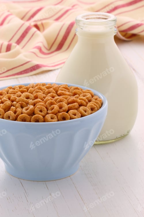 Preview: Bowl of Cereal and Milk Bottle on Table