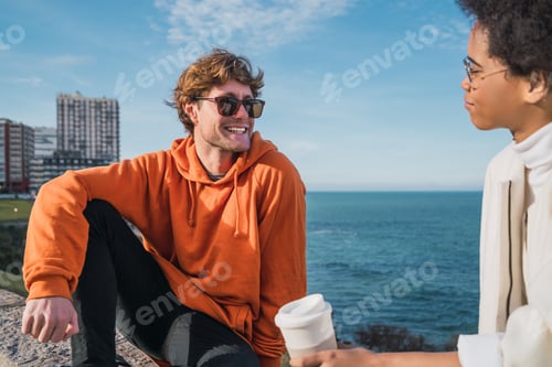Preview: Portrait Of Two Young Friends Spending Good Time Together And Having Fun With The Sea In The