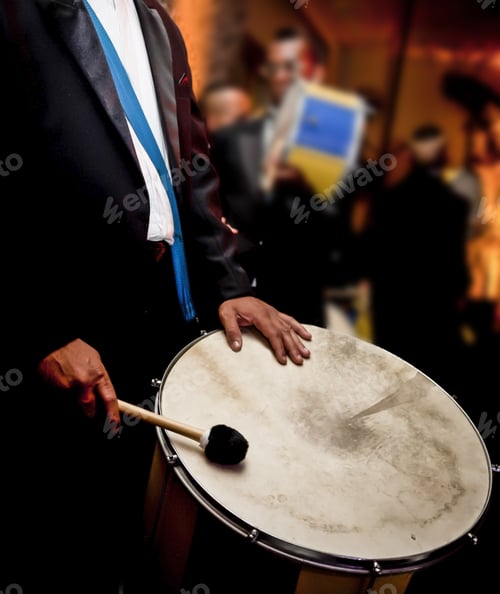 Preview: Man Playing Drums, Samba, At A Party.