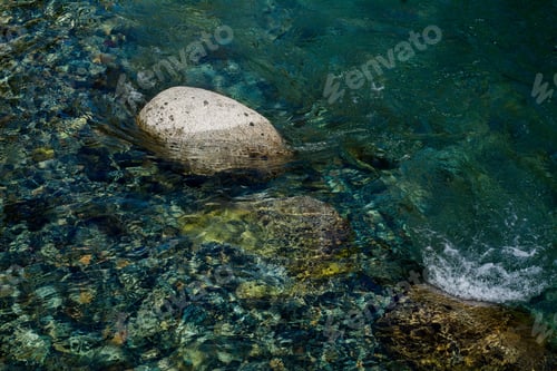 Preview: Close-Up Of The Flow Of Lake Water On A Stone.