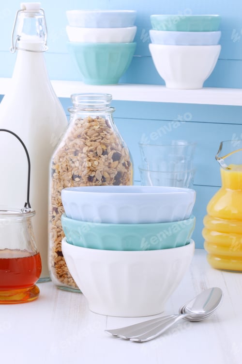 Preview: Delicious And Nutritious Breakfast Muesli Or Granola Cereal With Milk On Vintage Styling.