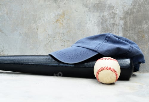 Preview: Baseball Bat And Cap Against A Concrete Wall As Background