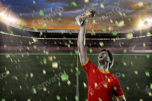 Preview: Belgian Soccer Player, Celebrating The Championship With A Trophy In His Hand. On A Stadium.