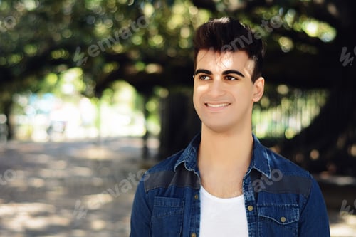 Preview: Portrait Of A Young Latin Man. Outdoors. Urban Concept.