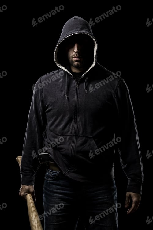 Preview: Thief In The Hood On A Black Background