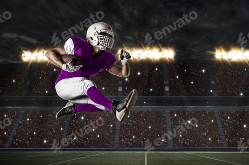 Preview: Football Player With A Pink Uniform Running On A Stadium.