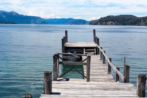 Preview: View Of An Empty Wooden Pier On Lake With Blue Sky On Background.
