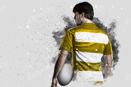 Preview: Rugby Player With A Yellow Uniform Coming Out Of A Blast Of Smoke .