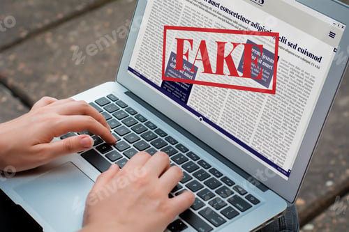 Preview: Closeup Of Young Woman Reading Digital Fake News On Laptop. Propaganda And Disinformation Online