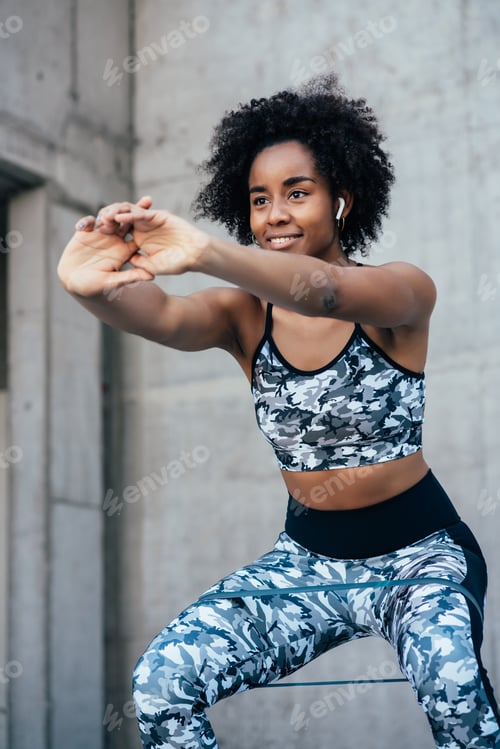 Preview: Afro Athletic Woman Doing Exercise Outdoors.
