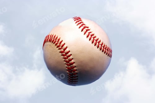 Baseball Close Up With Cloud Filled Sky Backdrop