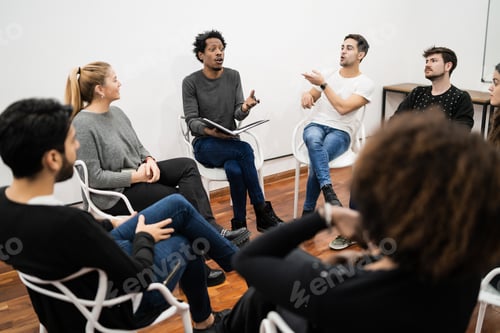 Preview: Group Of Multiethnic Creative Business People Working On A Project And Having A Brainstorming