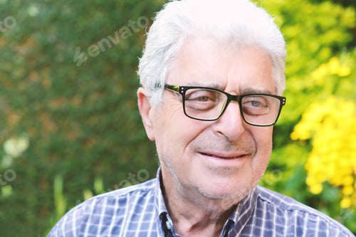 Preview: Portrait Of An Old Man Sitting Outside. Outdoors.
