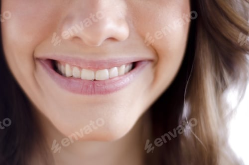 Preview: Closeup Of A Smile Of A Cute Young Woman